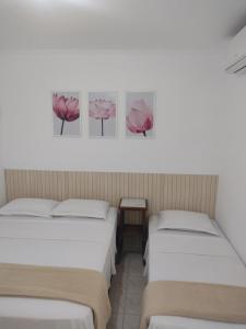 Krevet ili kreveti u jedinici u okviru objekta Pousada Rosa de Saron