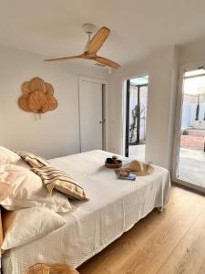 Ένα ή περισσότερα κρεβάτια σε δωμάτιο στο Casa Los Limones a 40 m de la playa +31 φωτογραφίες