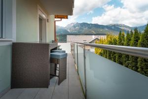 a balcony with a view of the mountains at Appartmenthaus Martina by Schladming-Appartements in Haus im Ennstal
