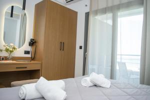 Postel nebo postele na pokoji v ubytování Hotel Golden Sun