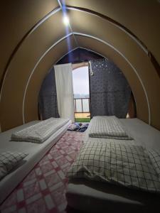 Ένα ή περισσότερα κρεβάτια σε δωμάτιο στο WD adventure Pangalengan