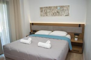 Postel nebo postele na pokoji v ubytování Hotel Golden Sun