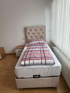 Tempat tidur dalam kamar di Pension - Panorama