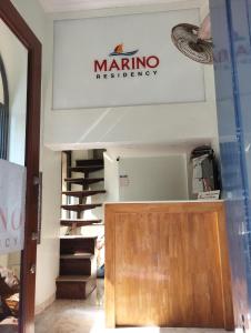 a shop with a marino sign on the wall at Marino Residency in Mumbai