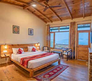 Postel nebo postele na pokoji v ubytování Yak and Yeti Inn