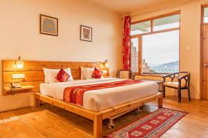 Postel nebo postele na pokoji v ubytování Yak and Yeti Inn