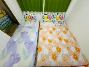 Postel nebo postele na pokoji v ubytování Vivere南5条