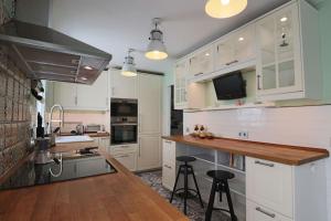 Η κουζίνα ή μικρή κουζίνα στο Adosado Familiar Los Enebros