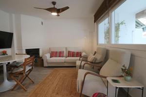 Μια τηλεόραση ή/και κέντρο ψυχαγωγίας στο Adosado Familiar Los Enebros