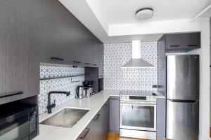 A kitchen or kitchenette at East Village 2br w doorman nr Union Square NYC-1155