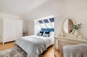 Katil atau katil-katil dalam bilik di Stargazing Filby, Norfolk Guest House