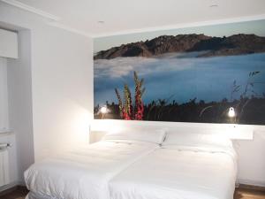 Cama o camas de una habitación en Hospedium Morada da Moa