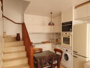 Kuchnia lub aneks kuchenny w obiekcie Estepona - Playa - 1 dormitorio con terraza solárium Mi17