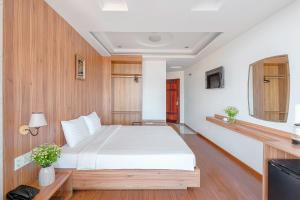 TV a/nebo společenská místnost v ubytování River Park Hotel Dalat