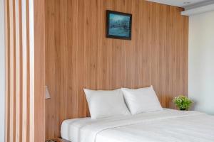 Postel nebo postele na pokoji v ubytování River Park Hotel Dalat