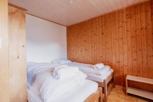 Postel nebo postele na pokoji v ubytování Studio avec vue sur les montagnes