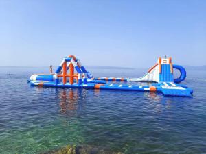 a water slide in the middle of the water at Apartments 4M in Kostrena