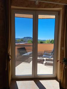 A balcony or terrace at Francesca Apartmanlakása