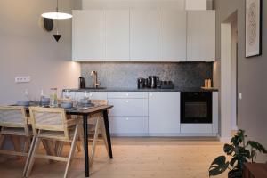 Kuchyň nebo kuchyňský kout v ubytování Centra Nams - Center Apartments