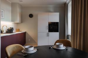 Kuchyň nebo kuchyňský kout v ubytování Centra Nams - Center Apartments