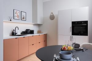 Kuchyň nebo kuchyňský kout v ubytování Centra Nams - Center Apartments