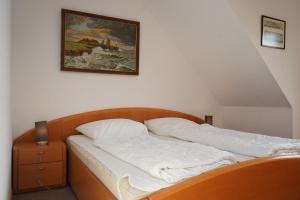 Ένα ή περισσότερα κρεβάτια σε δωμάτιο στο Kurpark Domizil 6