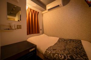 Postel nebo postele na pokoji v ubytování Hotel Peace (Adult Only)