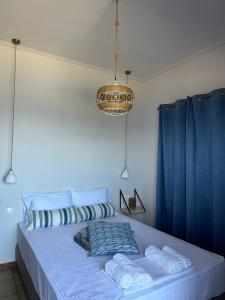 Postel nebo postele na pokoji v ubytování Amelia Beach Apartments