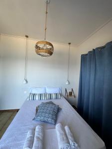 Postel nebo postele na pokoji v ubytování Amelia Beach Apartments
