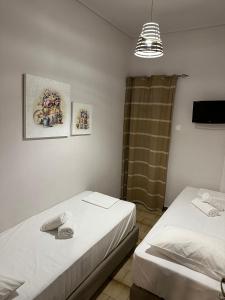 Postel nebo postele na pokoji v ubytování Amelia Beach Apartments