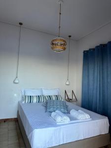 Postel nebo postele na pokoji v ubytování Amelia Beach Apartments