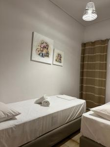 Postel nebo postele na pokoji v ubytování Amelia Beach Apartments