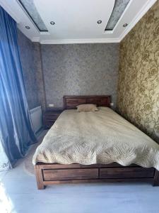 Ένα ή περισσότερα κρεβάτια σε δωμάτιο στο alisas home 40