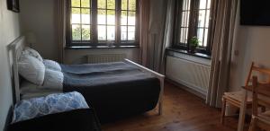 Posteľ alebo postele v izbe v ubytovaní Willa Old House