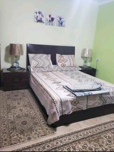 Giường trong phòng chung tại Family Friendly Appartement-Giza