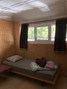 Rúm í herbergi á BnB122 bed&breakfast