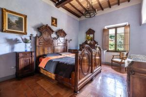 Voodi või voodid majutusasutuse Monticchiello apartment in the historical village with garden Pienza, Siena toas