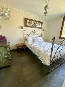 a bedroom with a bed and a lamp at Apartment The Address in Carcassonne