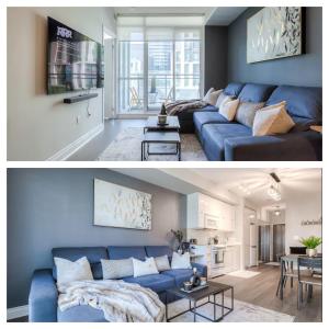 a living room with a blue couch and a kitchen at Holiday Premium INN in Toronto