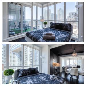 a bedroom with a bed and a large window at Holiday Premium INN in Toronto