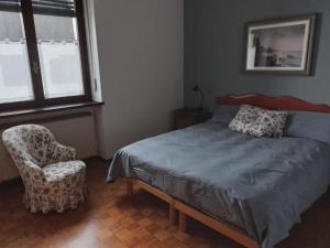 Giường trong phòng chung tại Appartamento Conca dei Rododendri