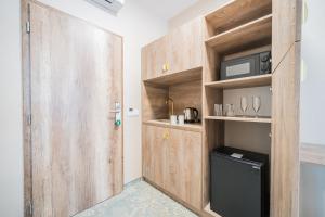 Kuchyňa alebo kuchynka v ubytovaní Rabie Aparthotel + 37 fotografií