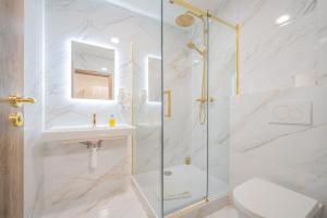 Kúpeľňa v ubytovaní Rabie Aparthotel
