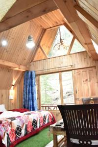 Ένα ή περισσότερα κρεβάτια σε δωμάτιο στο The Riverbank Nest