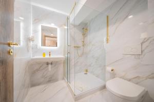 Kúpeľňa v ubytovaní Rabie Aparthotel