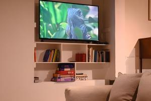 Μια τηλεόραση ή/και κέντρο ψυχαγωγίας στο Casa de Campo en la costa de Pelluhue +12 φωτογραφίες