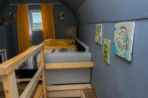 Postel nebo postele na pokoji v ubytování 4NORTH Tiny house on the Durmitor's ring