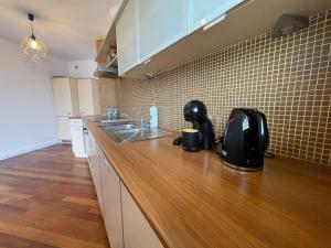 Kuchyňa alebo kuchynka v ubytovaní Arkadia The View Luxury Prime Apartment