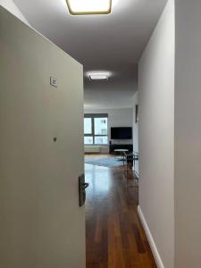 Televízia a/alebo spoločenská miestnosť v ubytovaní Arkadia The View Luxury Prime Apartment