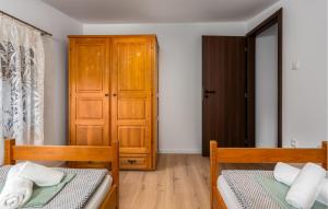 Posteľ alebo postele v izbe v ubytovaní Stunning Apartment In Novi Vinodolski
